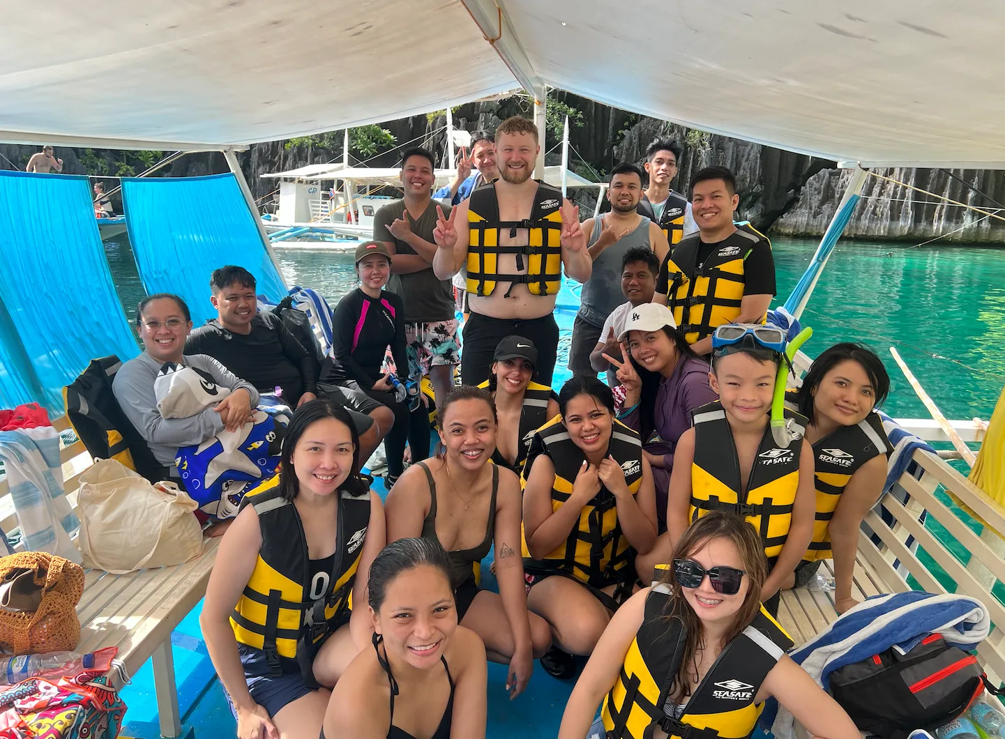 The Concinnity team boating between islands in Coron, 2023